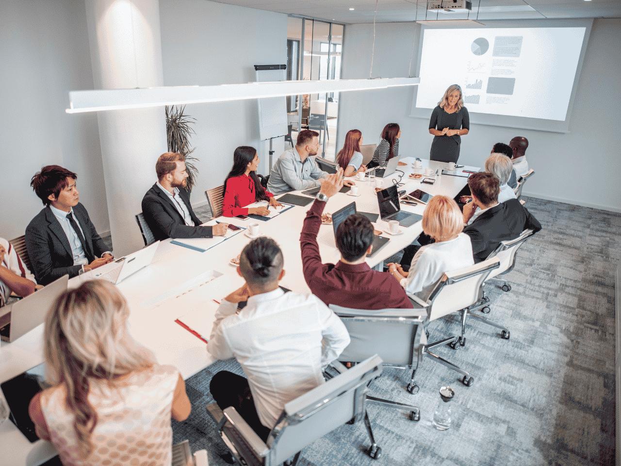 Woman leading a board room